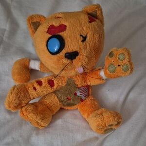 Orange Plush Cat Toy with Blue Eyes